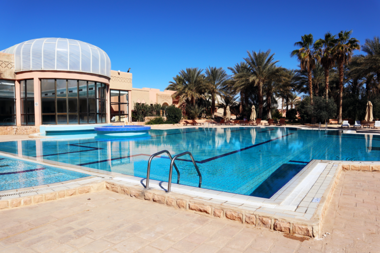 palm beach palace swimming pool, tozeur-go explore radio